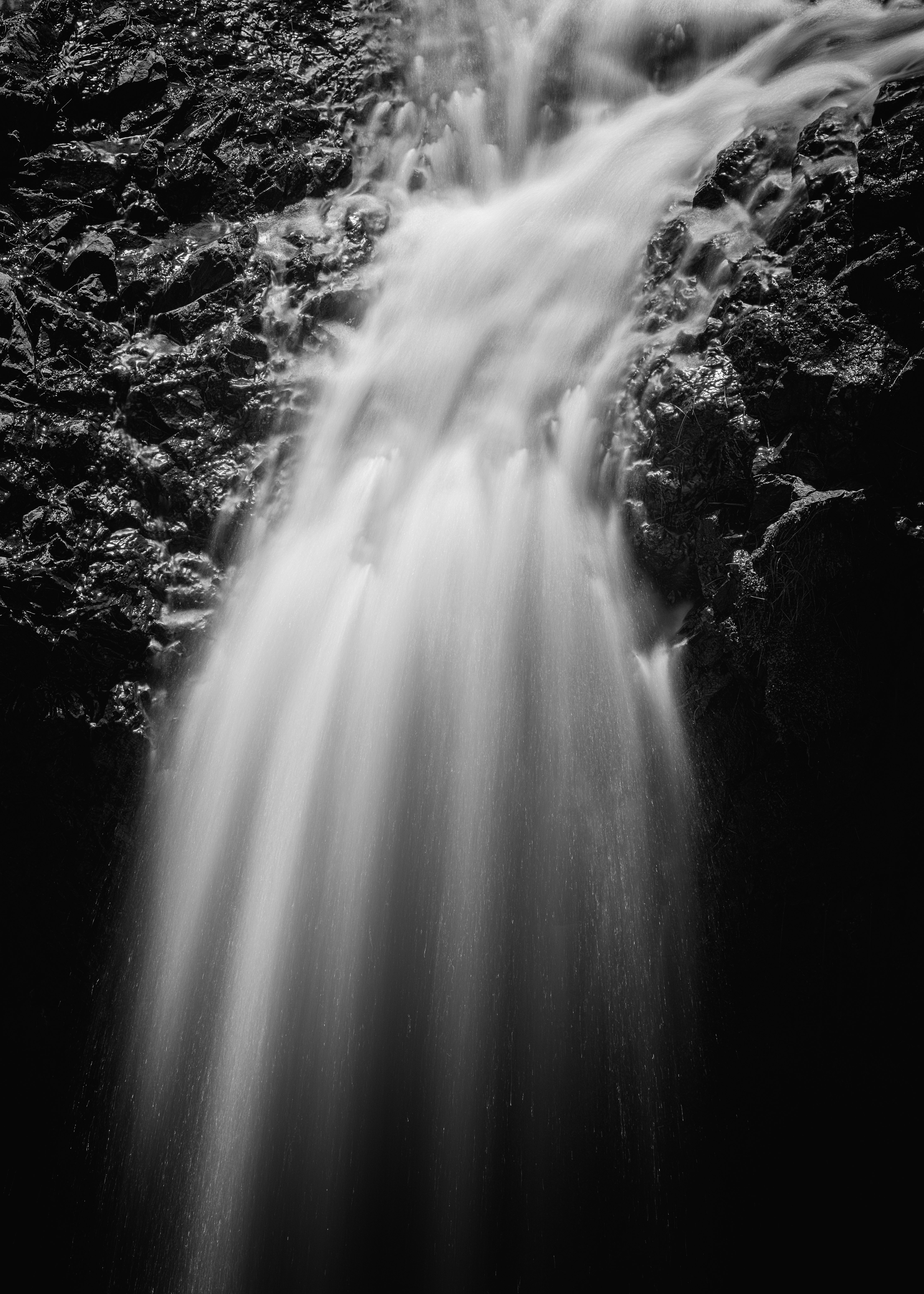 grayscale photo of water falls